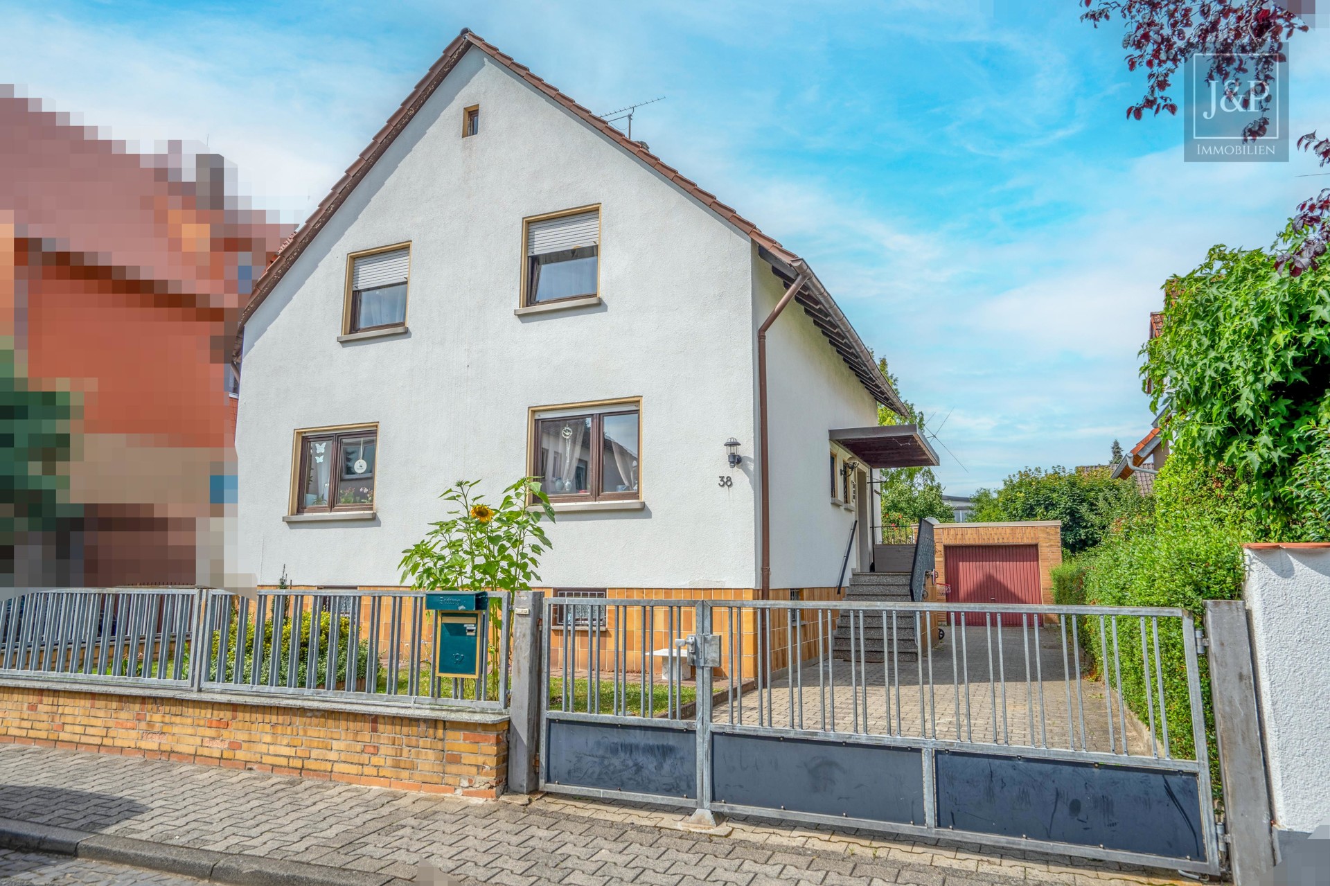 Einfamilienhaus mit großem Garten (Baugrundstück) in Bestlage von Erzhausen! - Vorderansicht