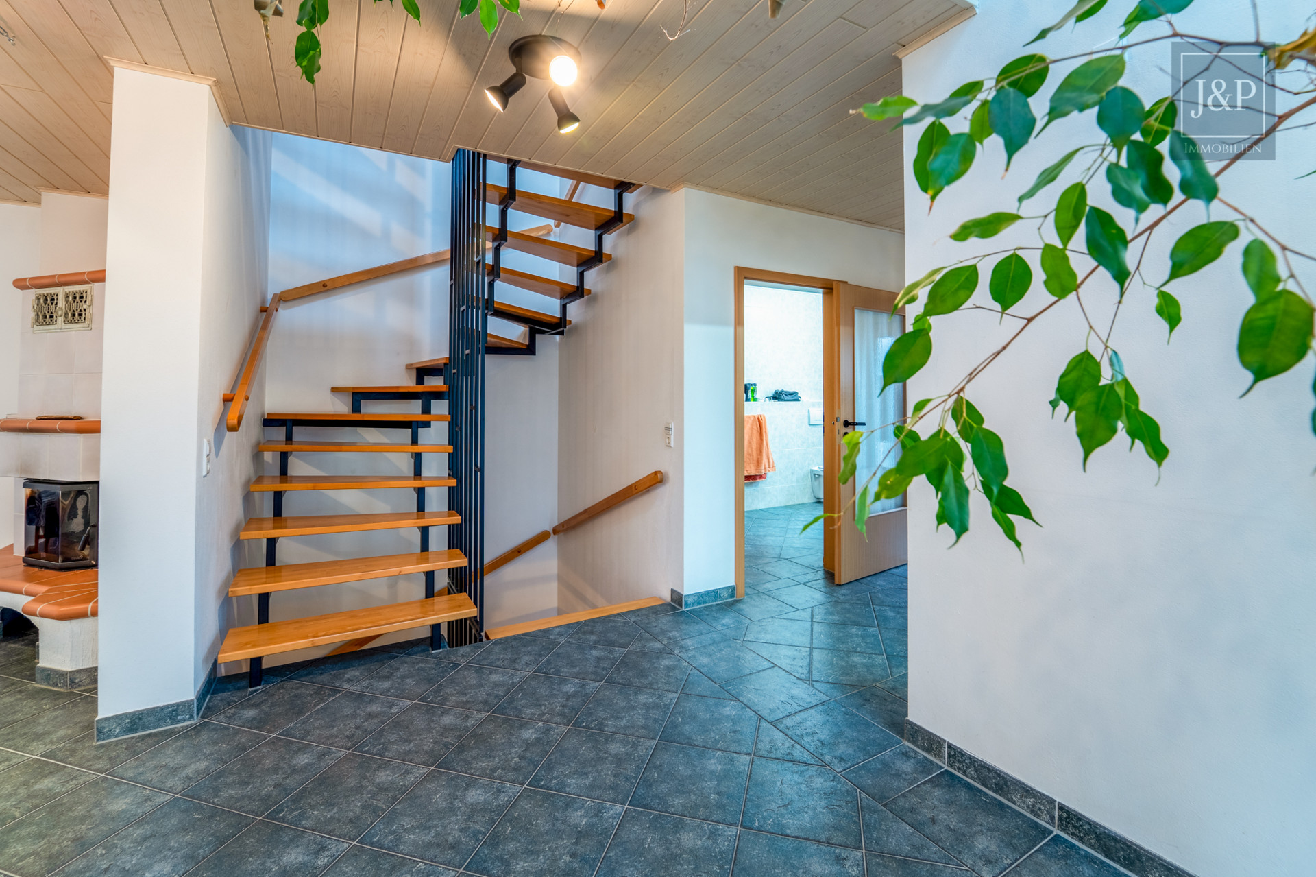 Architektonisches Highlight: Großzügige Doppelhaushälfte mit Luftraum & Smarthome - Treppe